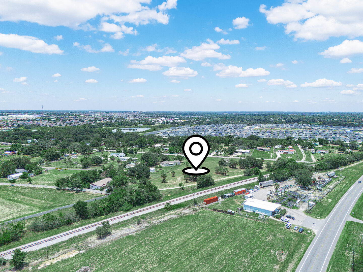 Regional context aerial with location pin