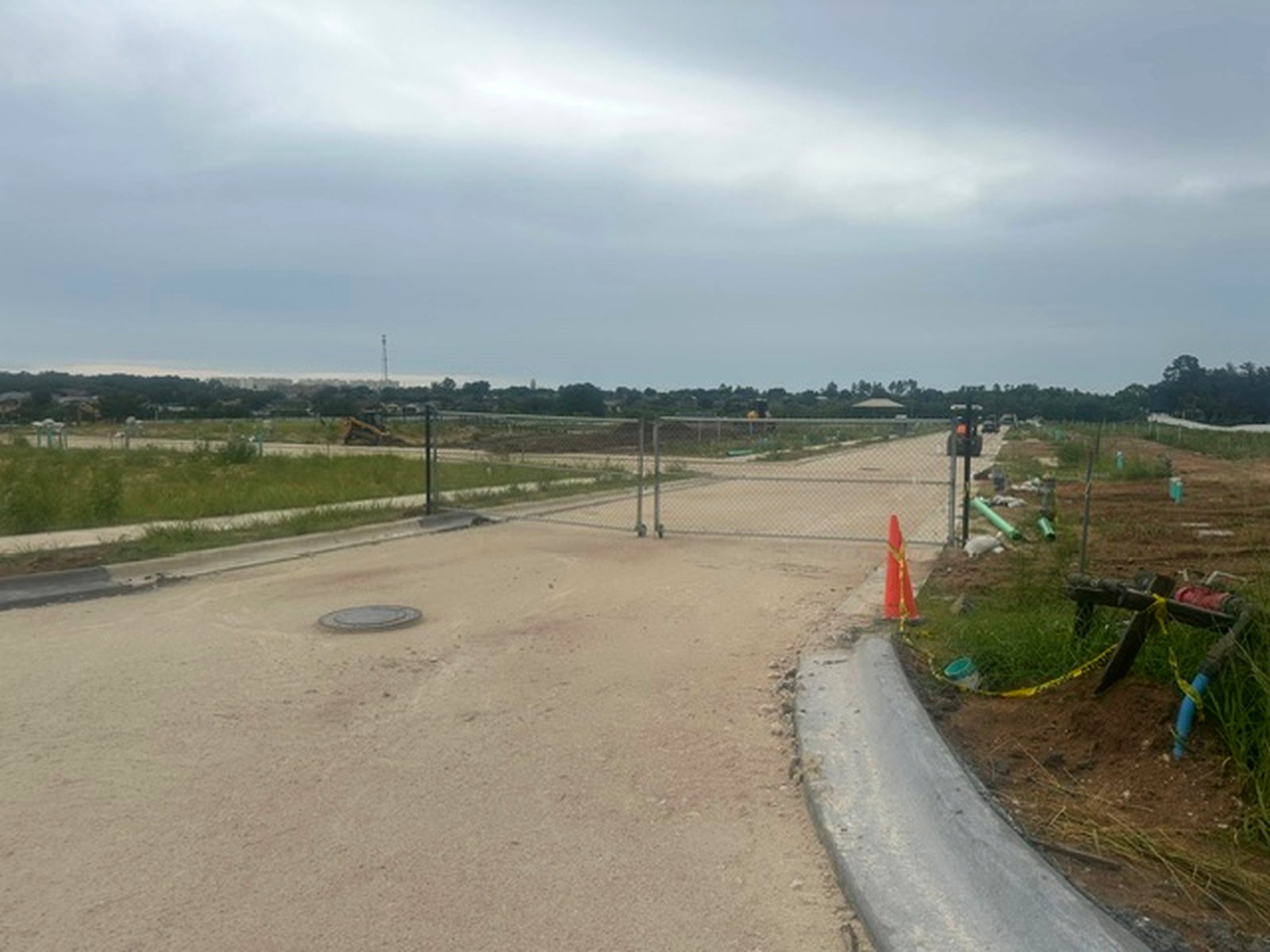 Active grading and construction at the Olsen Cove Townhomes site